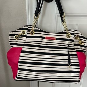 Betsey Johnson adorable carryall handbag.  New. Black/White striped/pink bow